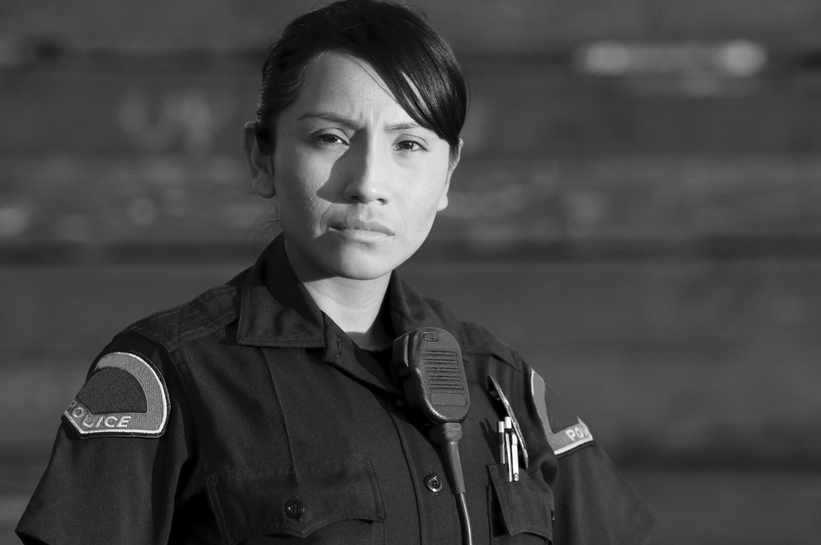 Police stress shown on the face of a female cop.